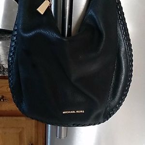 Michael Kors black leather purse.
